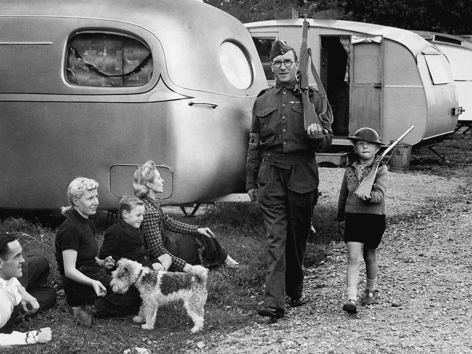 Homeguard patrolling in a caravan colony
